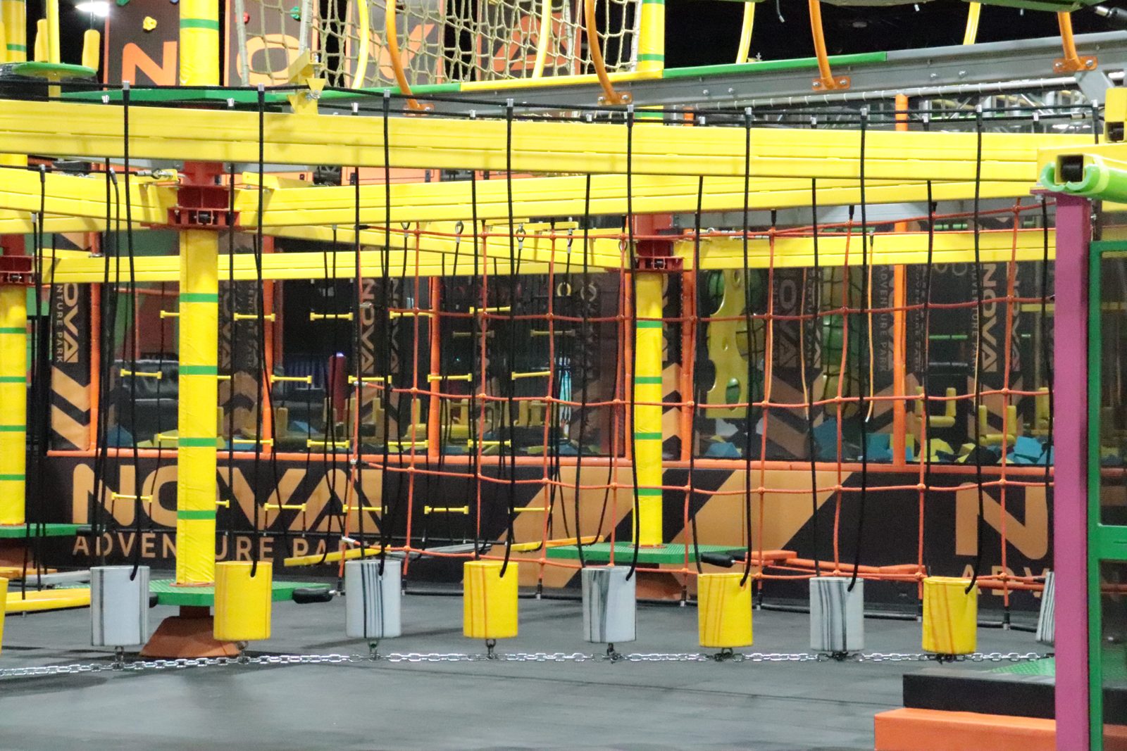 Ropes course high above the park floor at Nova Adventure Park