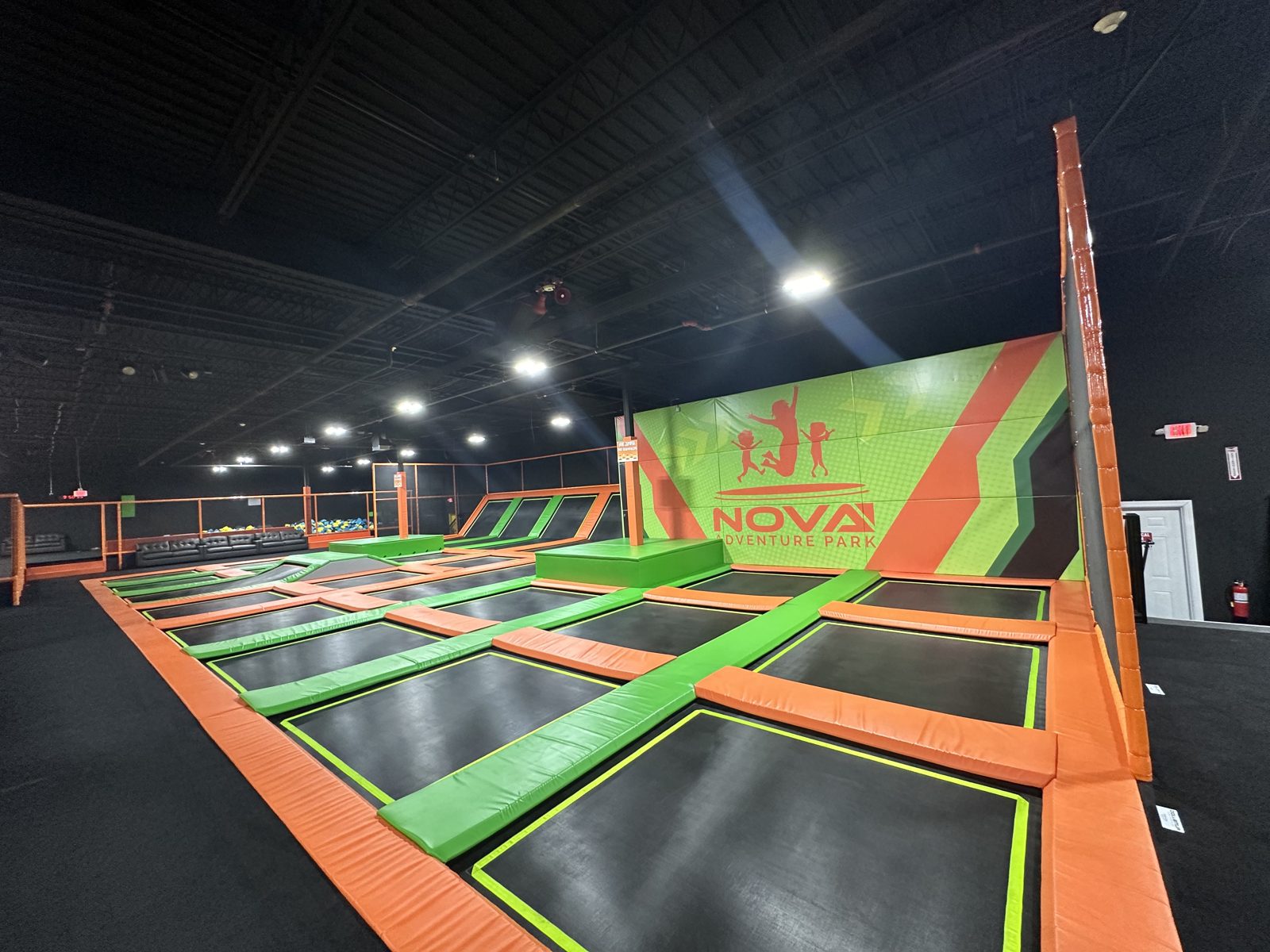 Kids jumping on the trampoline court at Nova Adventure Park